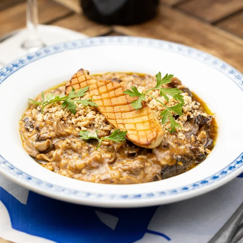 Foto do risoto de cogumelos no cardapio oficial do Cabernet